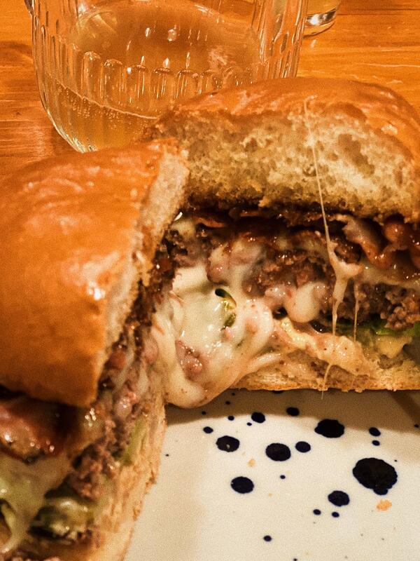 Juicy Lucy burger close-up at SMA bar Tbilisi